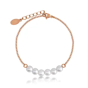 Kuleczkowa bransoletka w kolorze perłowym, drobny stalowy łańcuszek w miedzianym odcieniu