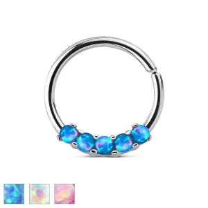 Stalowy piercing srebrnego koloru, lśniący krążek z syntetycznym opalem - Kolor kolczyka: Niebieski