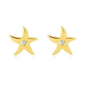 Kolczyki z żółtego złota 375 - gwiazda morska, przezroczysta okrągła cyrkonia, sztyfty