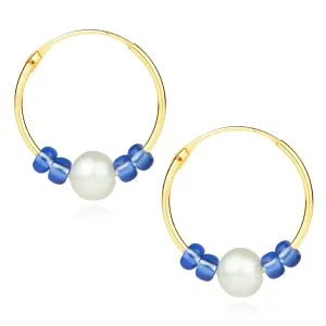Okrągłe kolczyki z 9K złota - biała perła słodkowodna, niebieskie kryształki